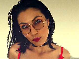 Latina with a Sensual Body Posing in Her Latex Skirt