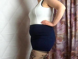 Mini skirt heels and fishnet stockings