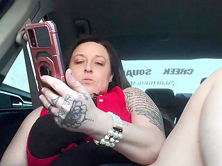 Horny Slut Watching Porn Using Dildo in Car While Driving Down the Road