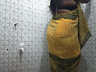 Cute desi girl slowly undressing in bathroom