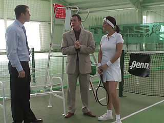 Redhead slut double penetrated on the tennis court