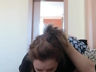 While he watches TV, I give him a blowjob