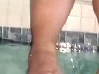 Foot Fetish My Stepmom Models Them in the Hotel Pool