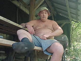 The big pig drinks his piss, shows off his curves, panards and stinking socks before jerking off by the river