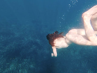 swim, sun and an unexpected orgasm in the middle of the sea