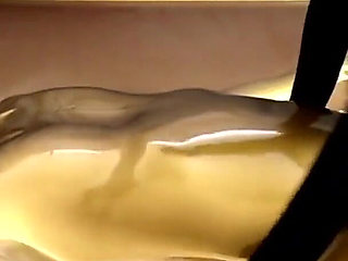 Latex Lovers Encased in Gold