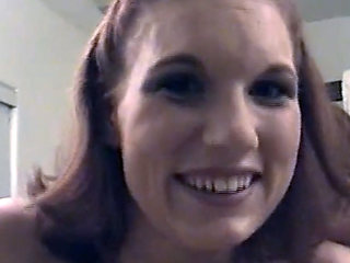 A fiery redhead works her magic sucking that small cock