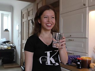 Brunette babe Sharlote slurps cock in steamy POV vid with ample naturals and flowing locks