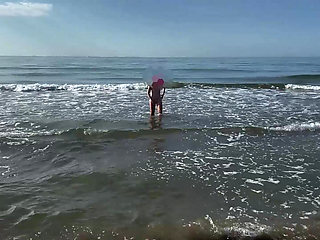 A hotwife and her cuckold on the beach