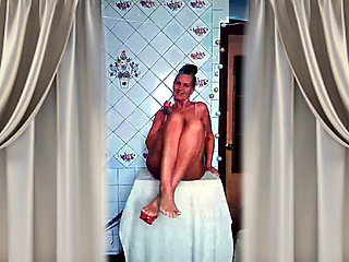 Hot Housewife Lukerya Teases with Her Hips and Feet in the Kitchen