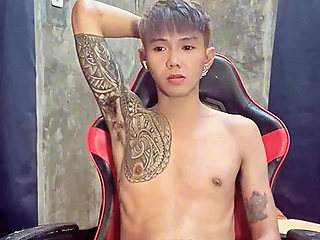 Pinoy Horny Inked Twink Playing with His Masturbator Toy