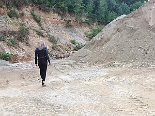 Grandma Is Walking Around a Gravel Pit in Tight Leggings and High Heels!