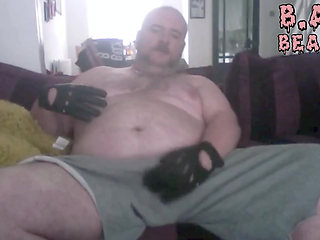 Daddy Wanks in his black leather gloves