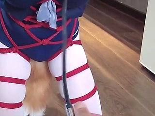 Mz31 - a Girl Tied and Suspended by a Red Rope Reaches Orgasm.