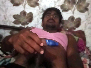 Black penis with big head and massaged by hand