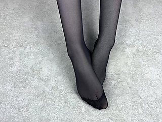 Mistress Caresses Her Feet in Black Nylon Pantyhose
