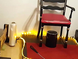 Busty Dominatrix Drenches Bound Slave in Sloppy Golden Shower