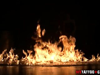 Tattooed Babe Kitten Poses with Fire in a Photoshoot - AltErotic