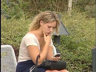 Cute blonde chick blows hard cock outdoors