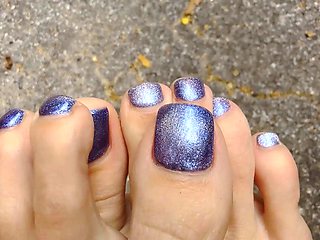 Brunette with foot fetish rubs big dick with her feet in POV