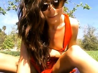 Small titted brunette Sharron with glasses masturbates