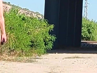 Slave Tih Shows Her Pussy and Tits Under the Bridge