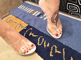 I squirt my hot partner's tattooed legs in latex high heels slippers