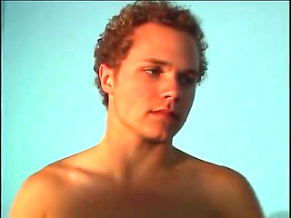 Horny twink watching himself masturbate