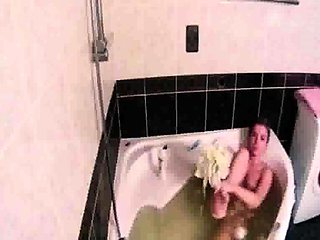 Peeking at stepdaughter Amy shaving in the bath