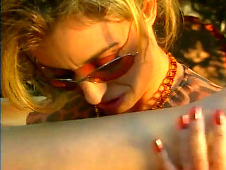 Vintage lesbians pussy licking dildo penetrated the swimming pool