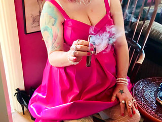 Pink To Make The Boys Wink! Tina Snua In A Leather Dress Smoking A Cigar