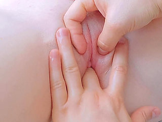 fingering her freshly shaved pussy just the way her loves it