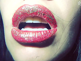 Red lips with golden glitter
