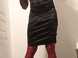 Crossdresser in dress and stockings
