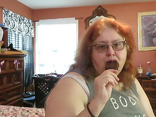 BBW redhead Mature Nurse vicki  licks and sucks on an ice cream