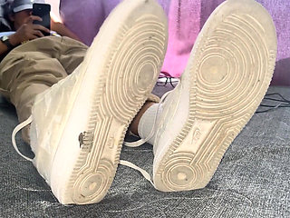 A University Rests Her Feet on Her Face so That the Adorers