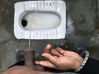 Desi Bhabhi Holding Stepbrother-in-law's Penis and Making Him Pee and Peeing Herself
