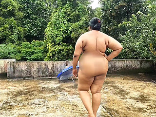 Big boobs and ass exposed on a rainy day in public, Beautiful chubby girls getting naked in rain outdoor.