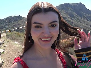 Public romance with a brunette beauty in a car