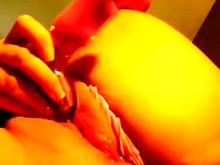 Webcam girl uses sex toy on her wet puffy pussy.