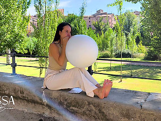 Inflating and Popping Them with Bare Feet Outdoors