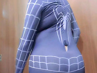 Spider-Man strips naked and shows his ass.