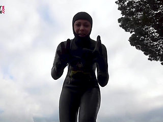 Wetsuit Giantess Finds a Tiny Toy to Tease