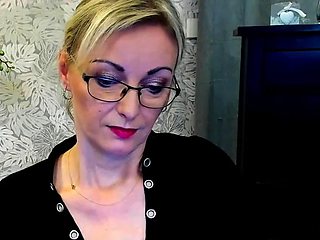 Blonde MILF takes off bra on webcam