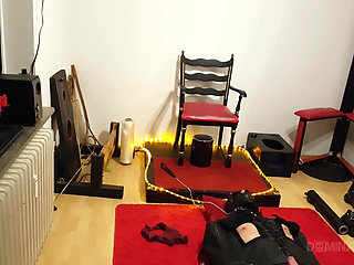 Busty Dominatrix Drenches Bound Slave in Sloppy Golden Shower