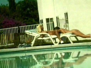 The hottest lesbian action by the pool with stunning classic sluts