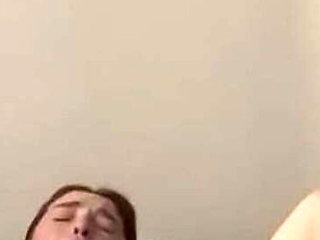 Young Teen Pleasures Herself with Toy on Bed