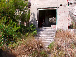 A redhead girl in fishnet stockings and black boots, bent over and slammed doggystyle in the countryside!