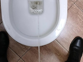 Pissing-in-toilet-