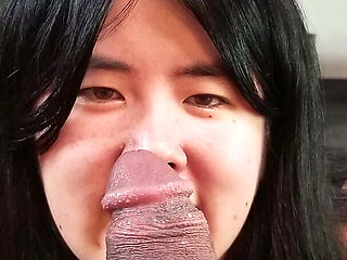 Chinese Girl Fits Her Tiny Mouth Around a Thick Black Cock